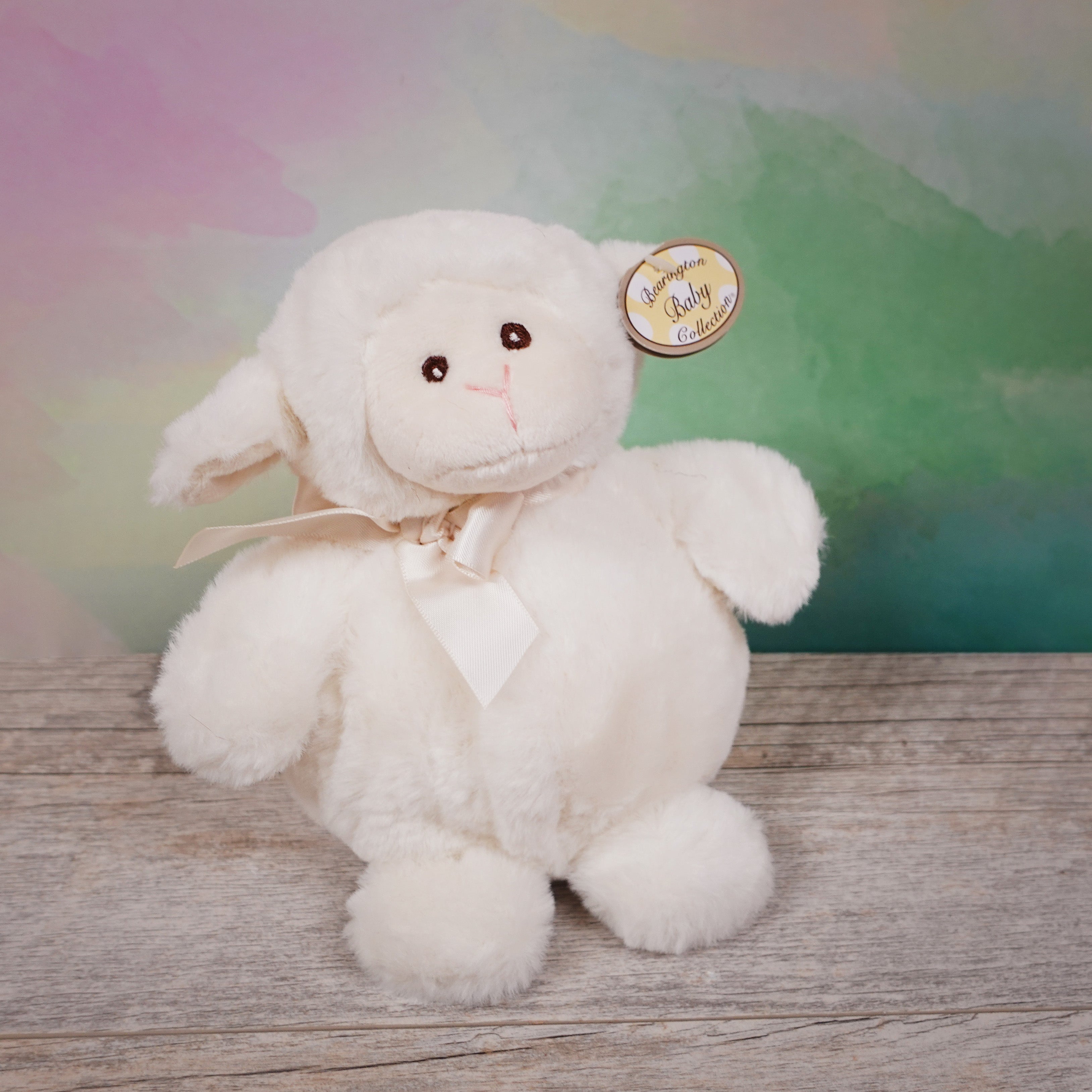 Lambykin - Lamb plush with white fur and a cream-colored ribbon around its neck