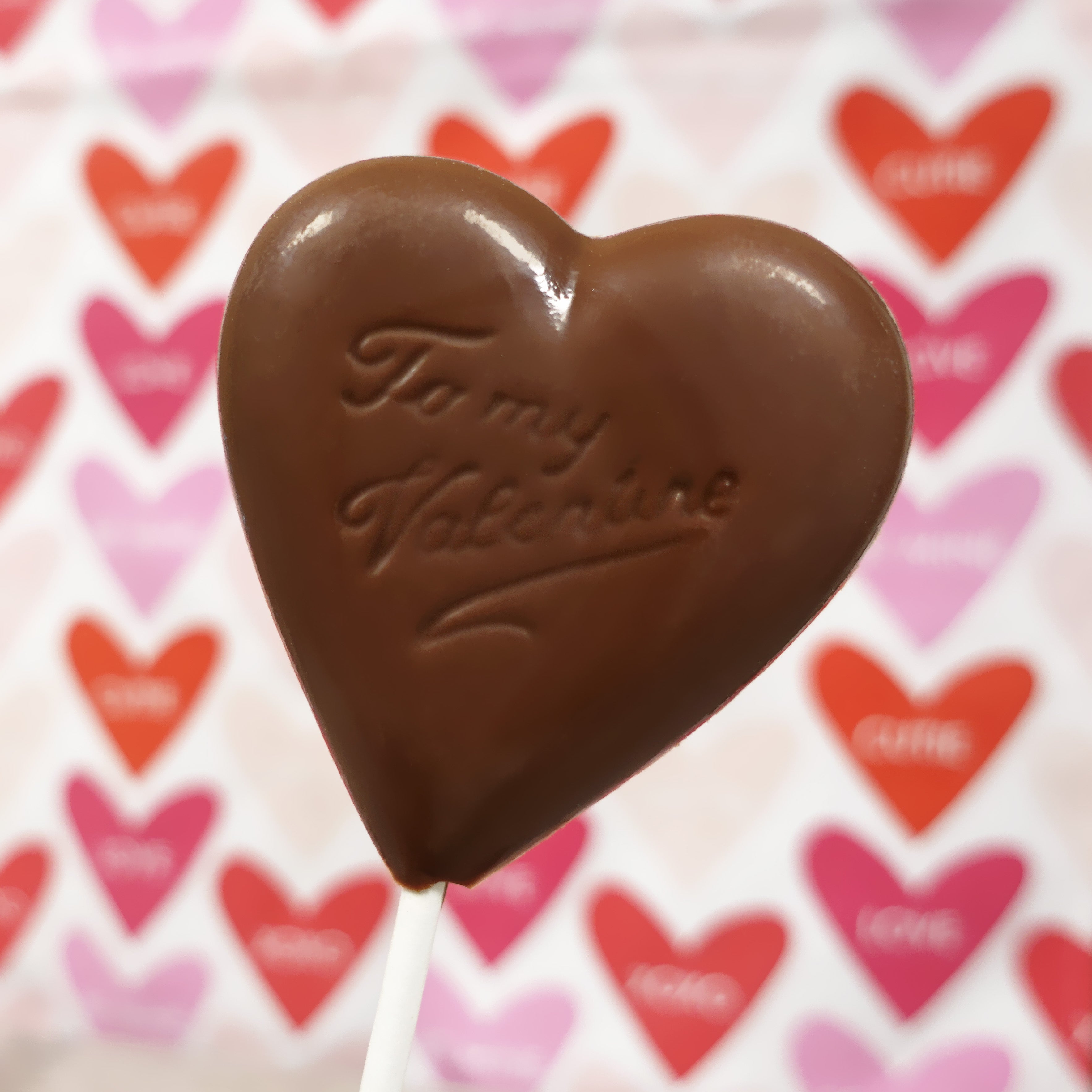 To my Valentine written on Lore's Chocolate milk chocolate lollipop heart.