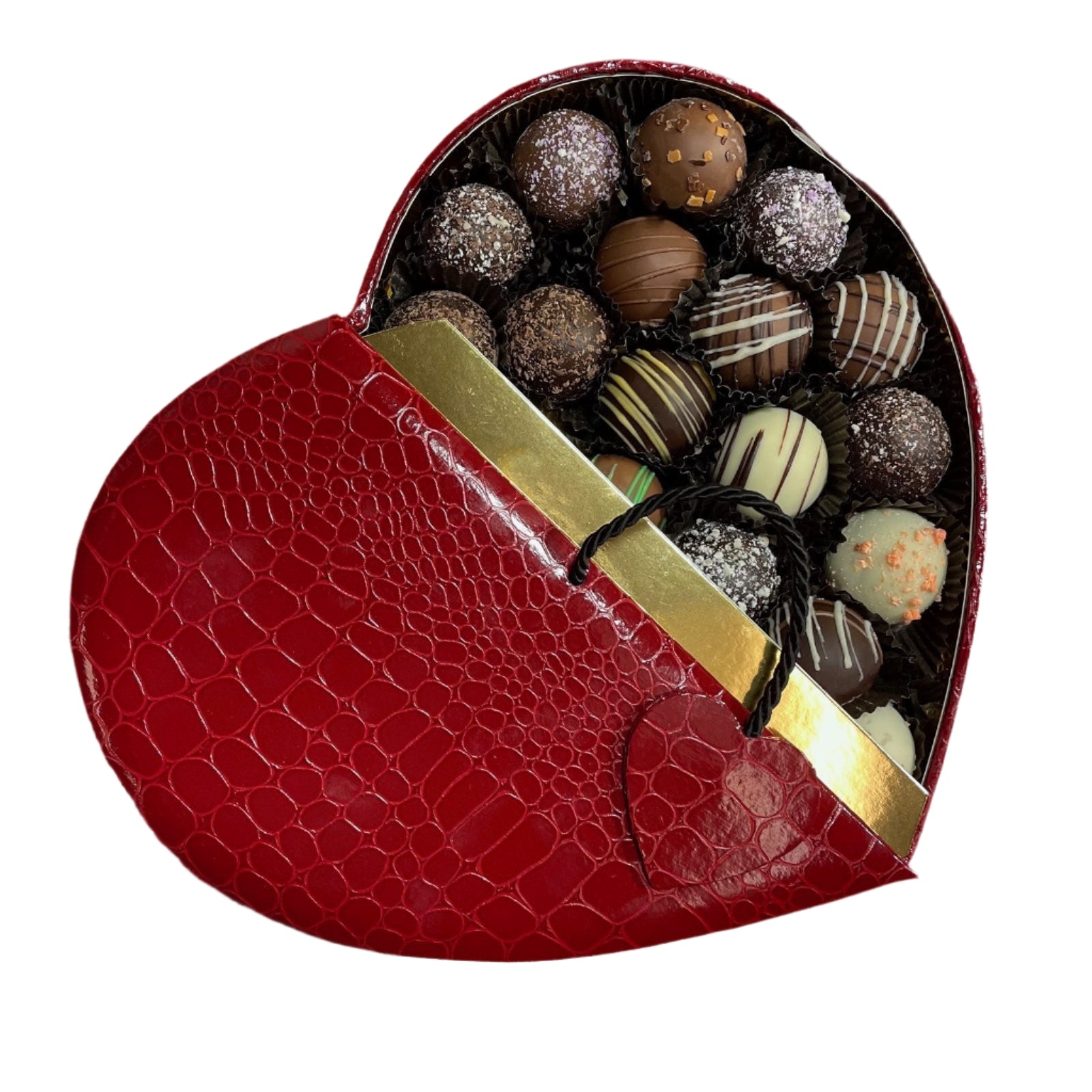 Heart shaped box with a crocodile/alligator leather pattern, opens in the middle with black cord with small alligator heart on door. One side open to show the contents - Artisan Truffles from Lore's Chocolates