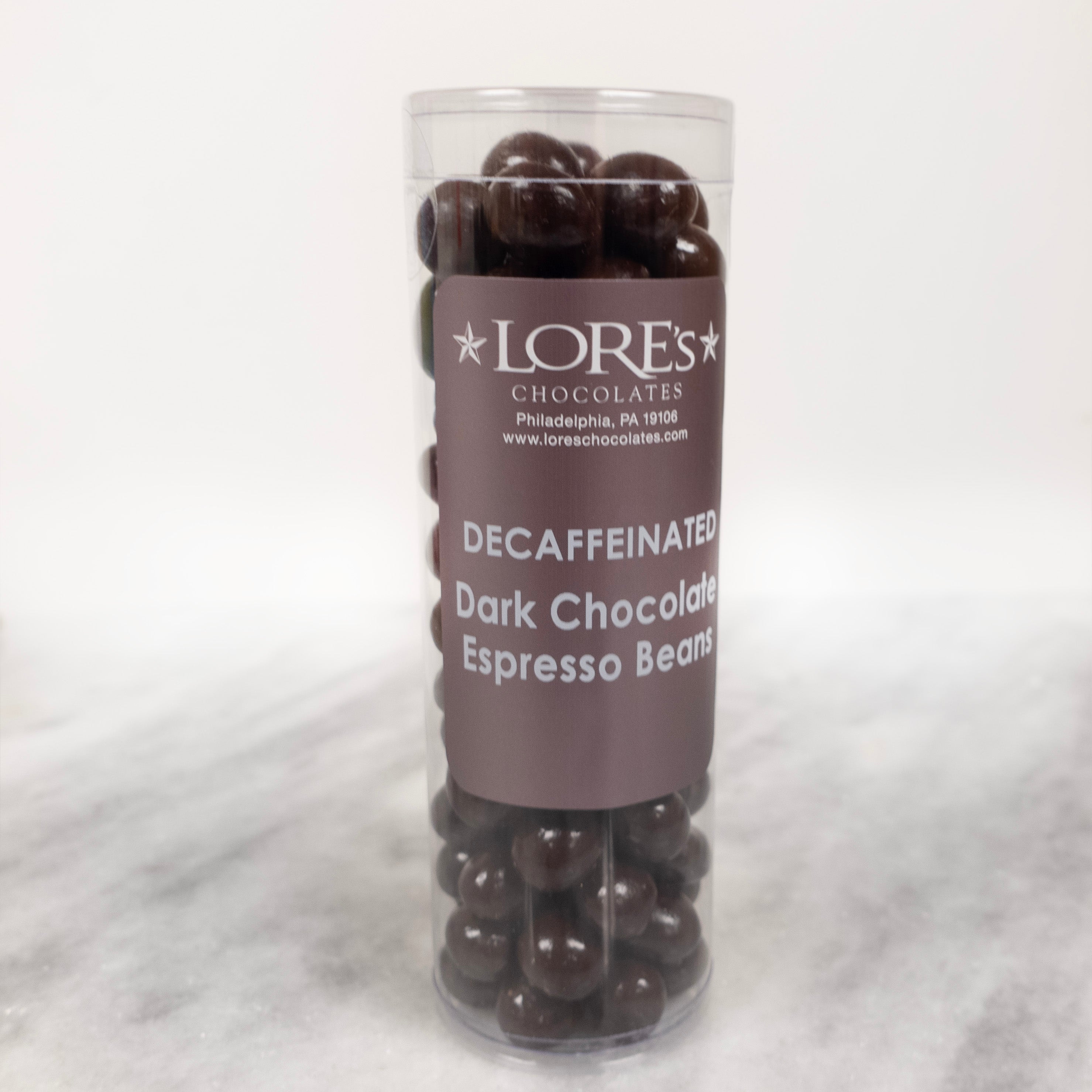 https://cdn.shopify.com/s/files/1/0400/8591/3767/files/decaffeinated_dark_chocolate_espresso_beans.jpg?v=1745942234
