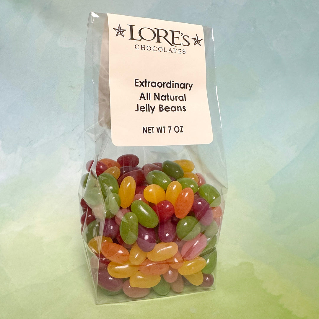 Bag of colorful extraordinary all natural jelly beans with a Lore's Chocolates label on a gradient background