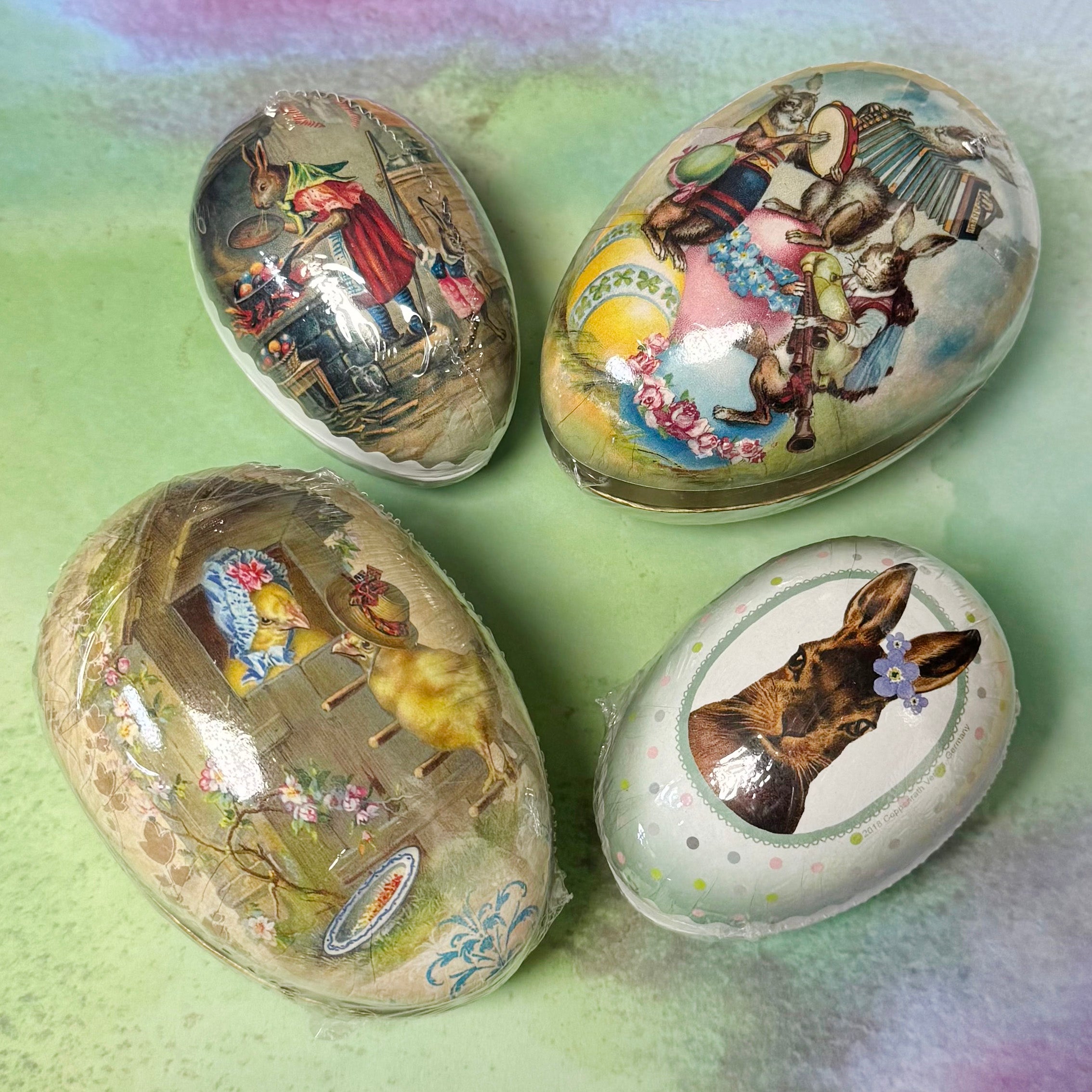 Decorative Easter eggs with vintage-style illustrations on a pastel background