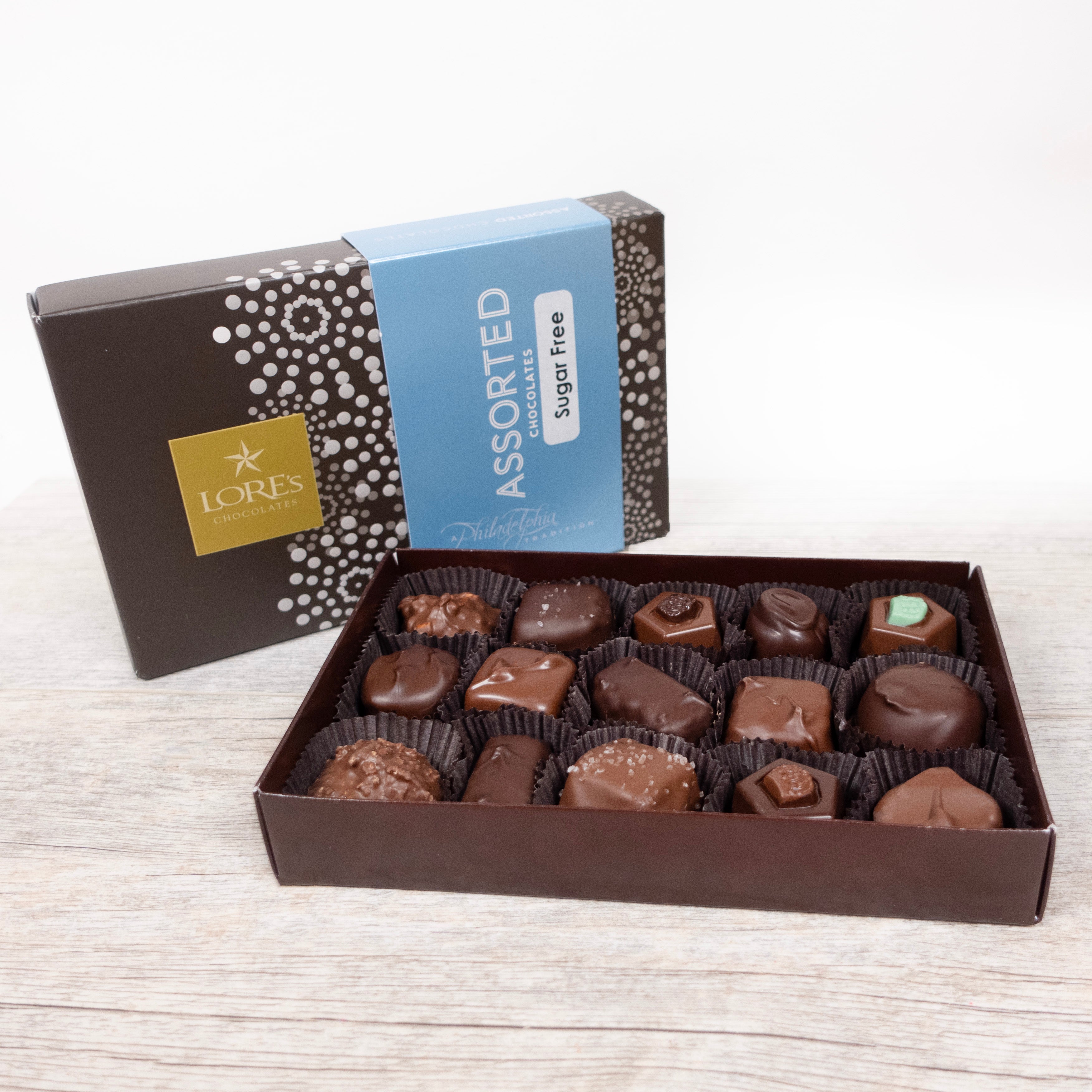 Assorted Half Pound Box of Sugar Free Chocolates from Lore's Chocolates in Philadelphia. The box contains a variety 15 Sugar Free Chocolates in both milk and dark chocolates.
