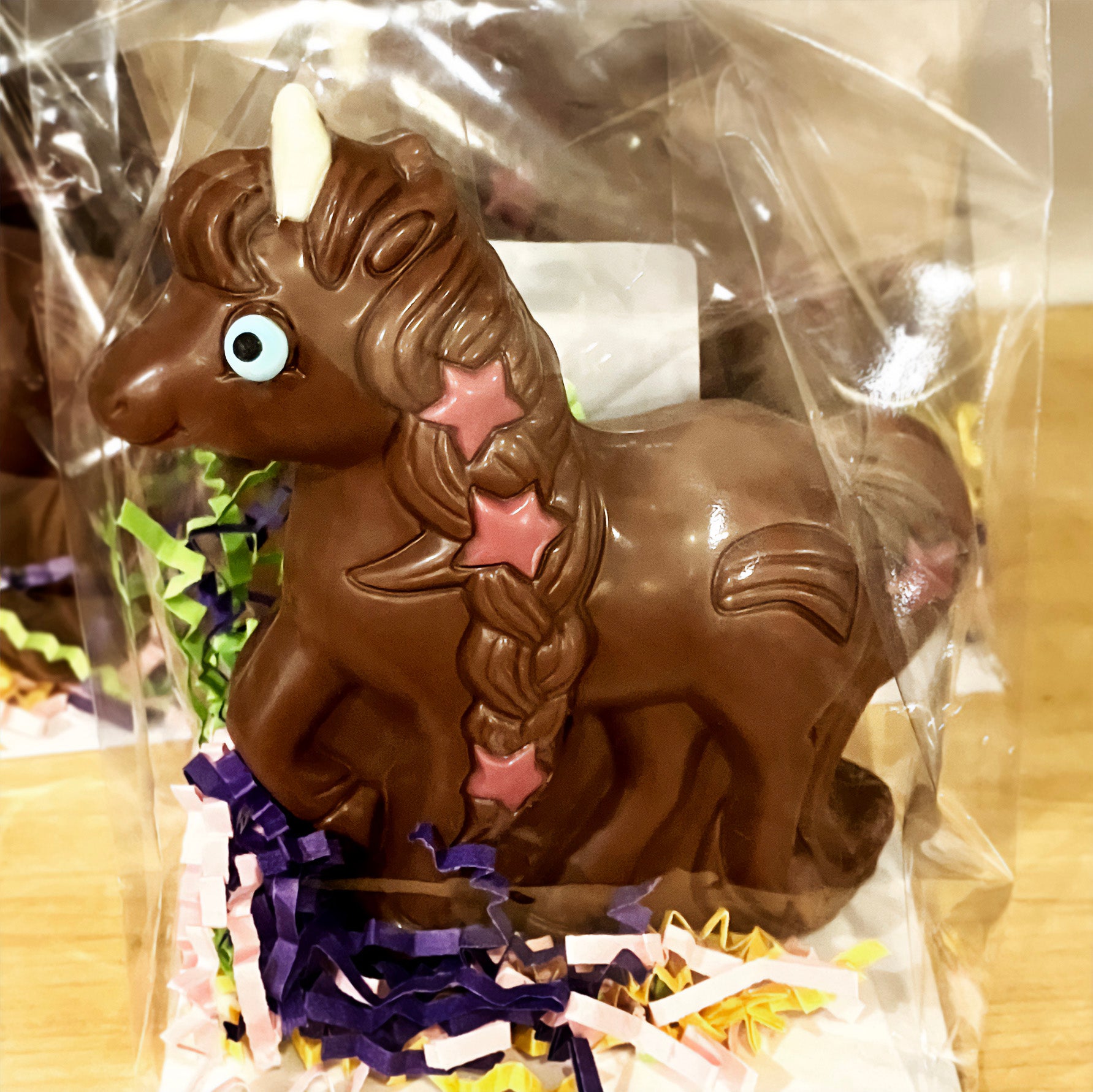 Unicorn Easter Pony in milk chocolate with pink ruby chocolate details handmade in philly by Lore's Chocolates