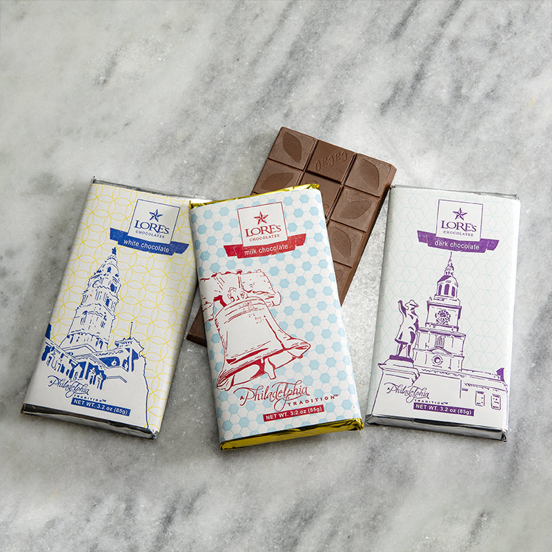 Philadelphia Chocolates made locally in Lore's Chocolate Factory - Wrapped with images of Historic Philadelphia landmarks such as the liberty bell, independence hall, or city hall. Milk chocolate, dark chocolate, and white chocolate.