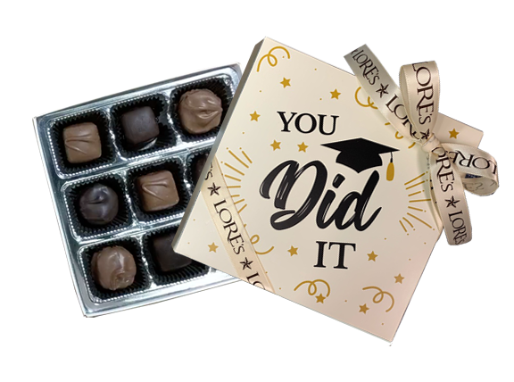 A gift box of Lore's chocolates with 'You Did It' graduation message, containing assorted milk and dark chocolate caramels and butter creams.