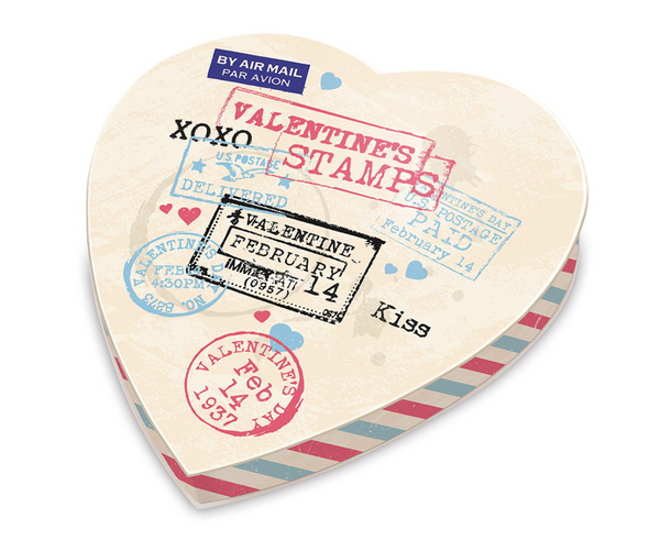 Heart shaped box decorated with vintage Valentine stamps