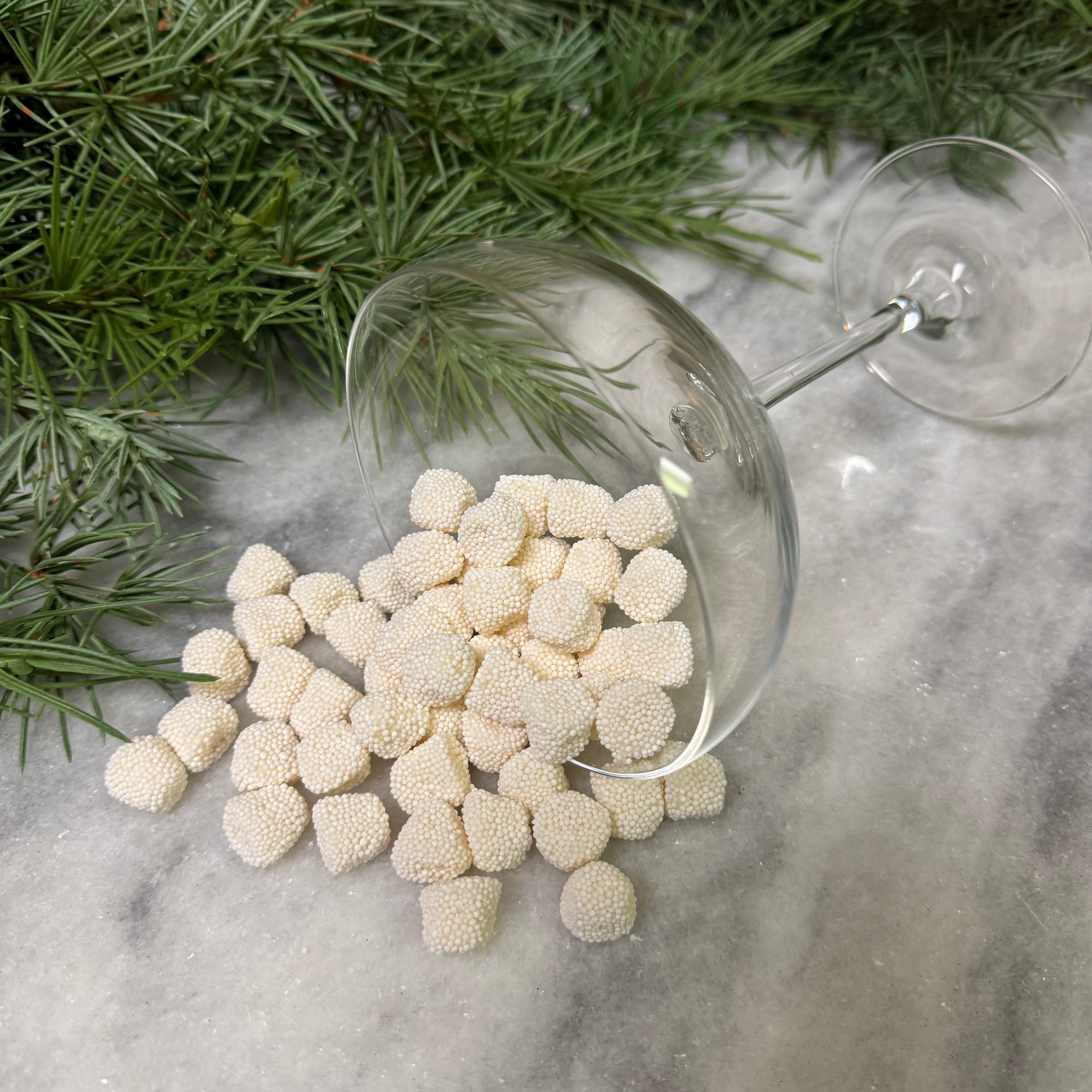 White Grape flavor Champagne Bubbles. Tender and chewy.finished with non pareil seeds