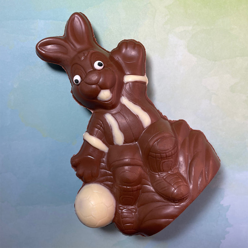 Milk chocolate Easter Bunny-with a white chocolate soccer ball-Semi Solid-7 1/2 inches tall
