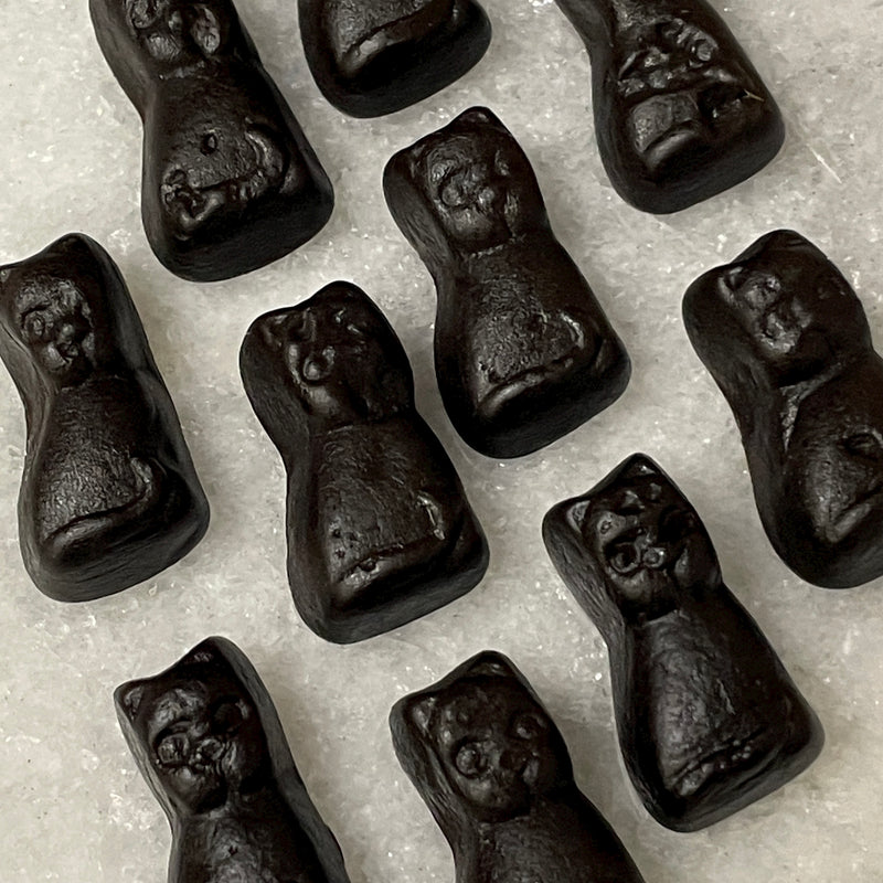 Close up of delicious black licorices shaped like black cats