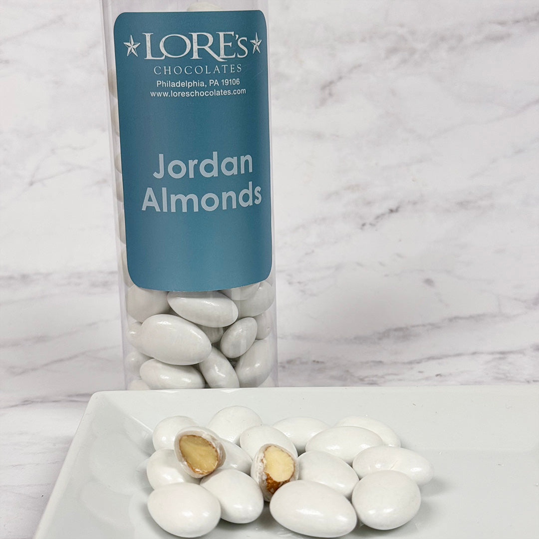 container of LORES Chocolates - Jordan Almonds on a marble surface