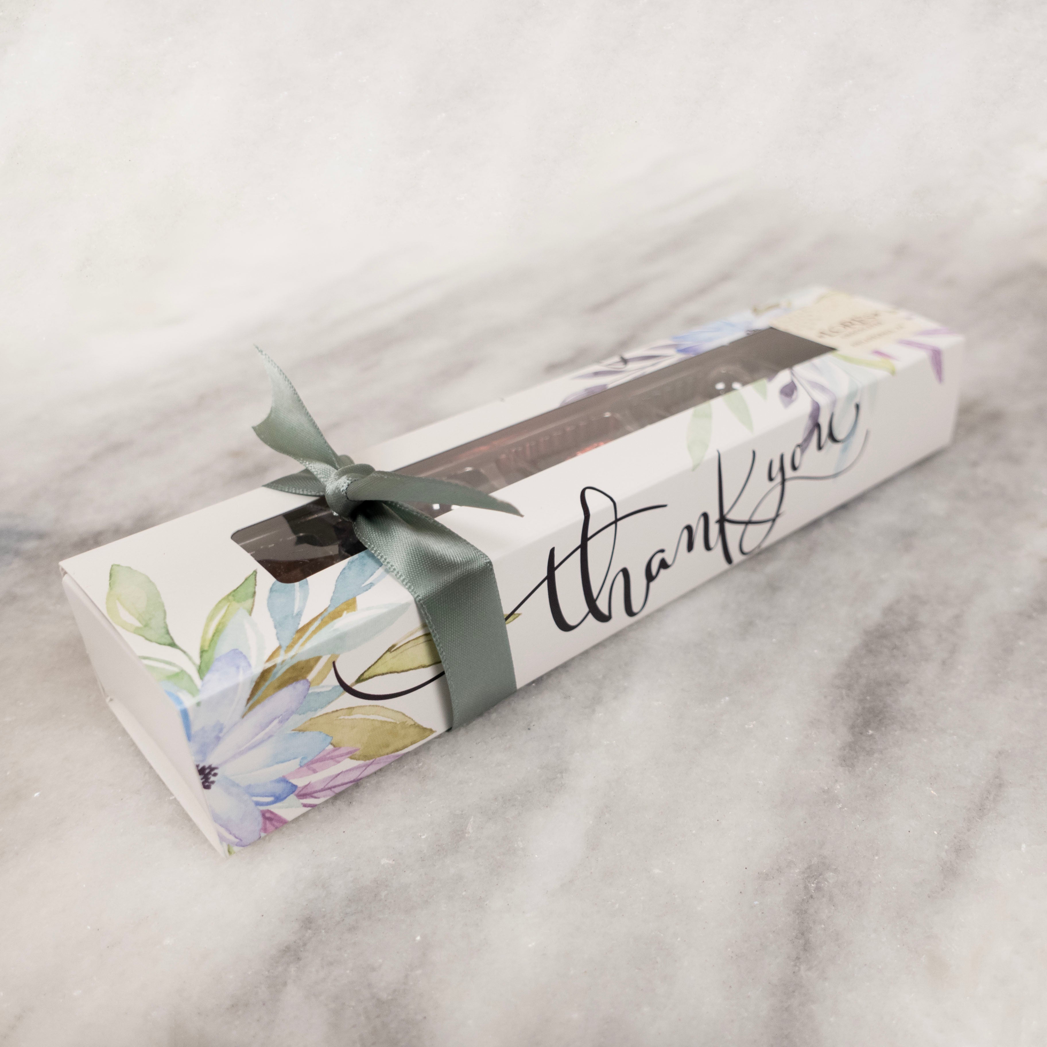 slider gift box with a script written "thank you" and floral watercolor design