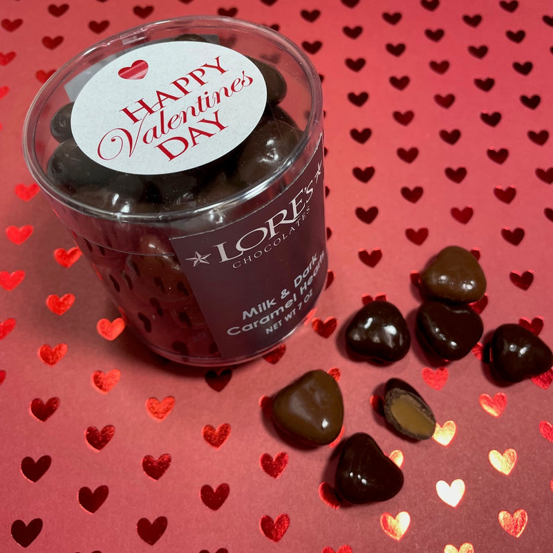 heart shaped caramels - milk and dark chocolate coated-packaged in a cylindeer decorated with a happy valentine sticker