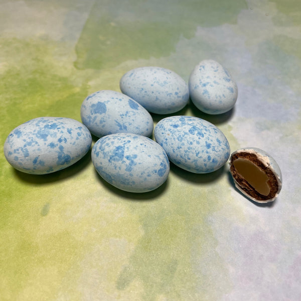 Caramel egg coated in milk chocolate- Robins egg blue shell.