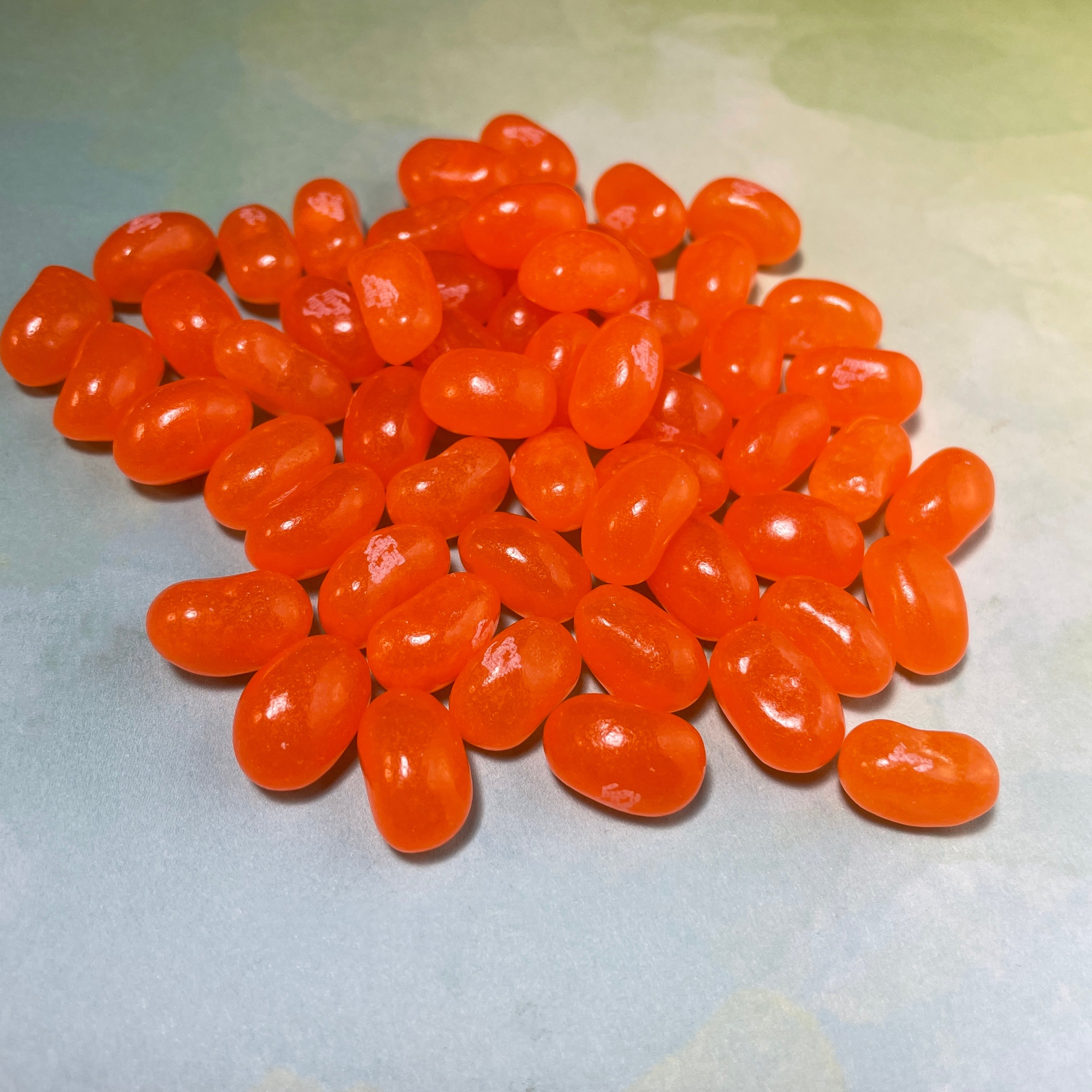 Close up of bright orange, Tangerine Jelly Beans from jelly belly