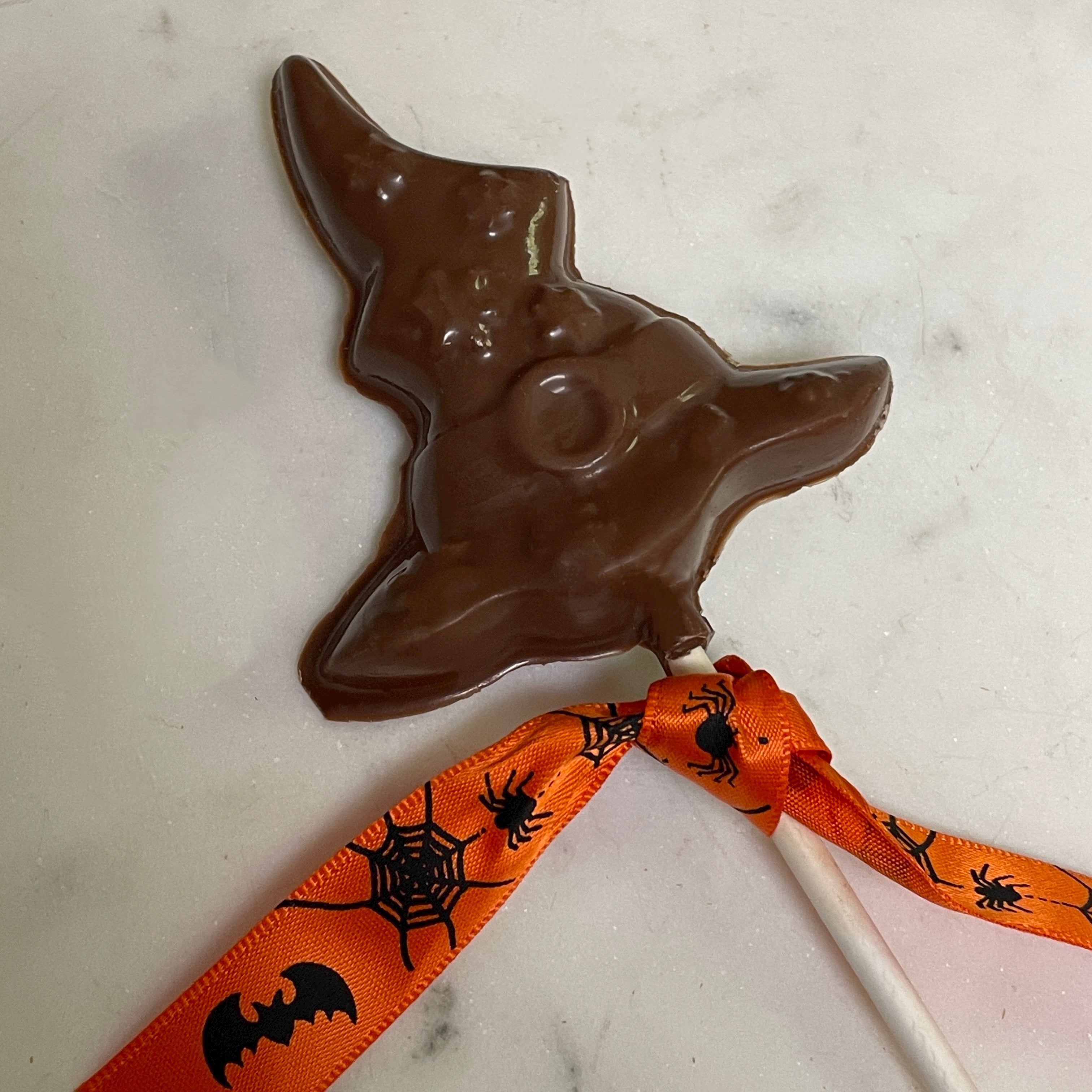 Milk chocolate witch or wizard hat with stars on it